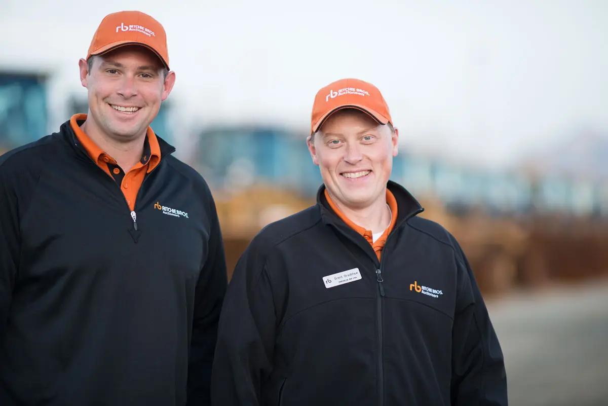 2 members of the Ritchie Bros' team