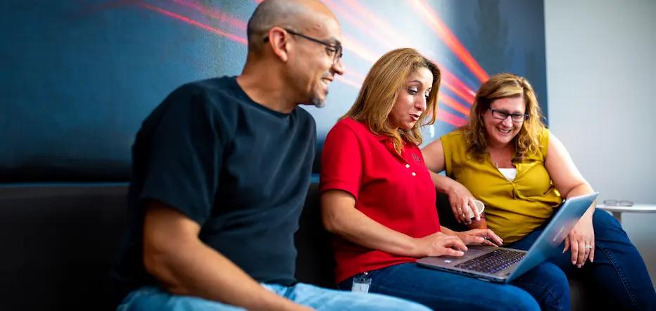 RB Global team browsing online auctions.
